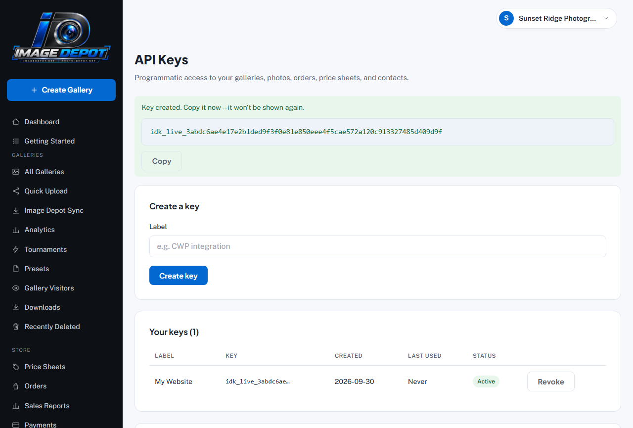 The API Keys page right after creating a key: a green box saying Key created, copy it now, it won't be shown again, with the full key and a Copy button; below, the new key listed under Your keys as My Website, Active, with a Revoke button