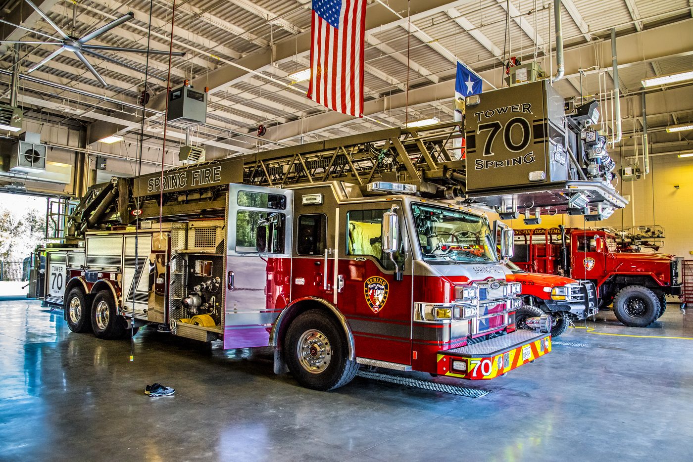 A fire department ladder truck inside its station, shot by a real working photographer
